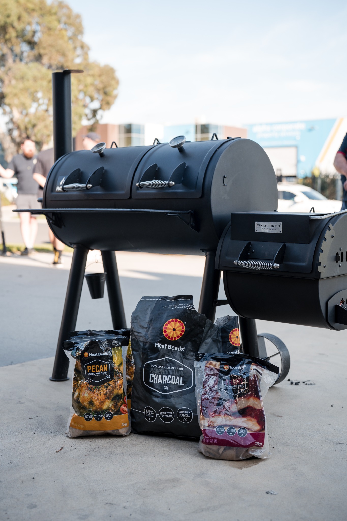 American barbecue smokers and Heat Beads fuel ready for class